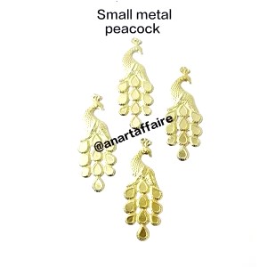 small metal peacock